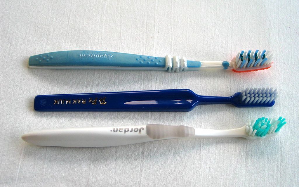 To clean the teeth, & remove gums use Toothbrush
